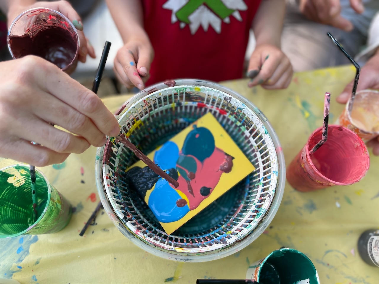Children's hands whilst painting